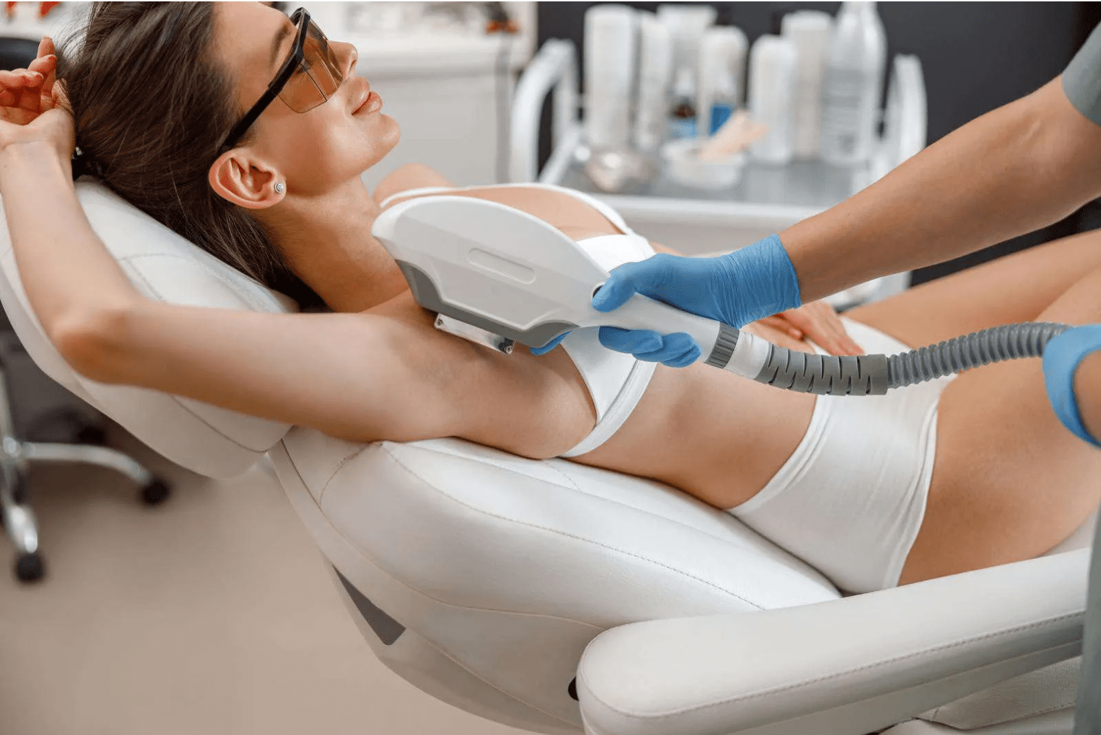 Woman receiving laser hair removal treatments